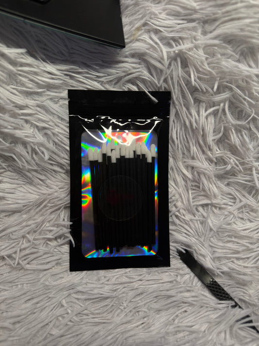 Black disposable lip swabs
